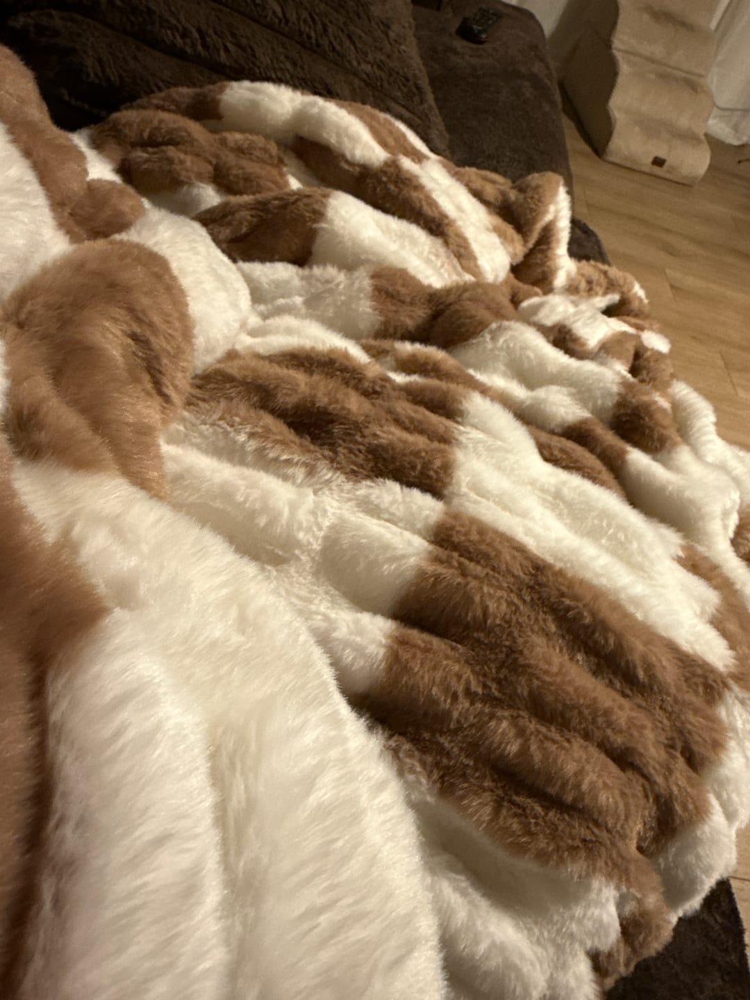 Customer photo review of Hugs Check Milk Chocolate Blanket