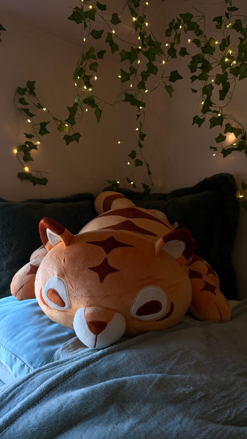 Customer photo review of GIANT 4LB Weighted Multi-Tiger Plush