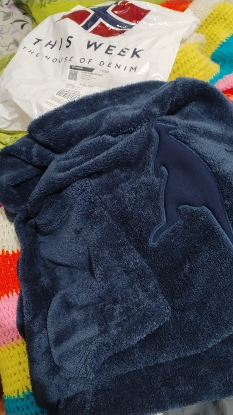 Customer photo review of Buzo Canguro Cole