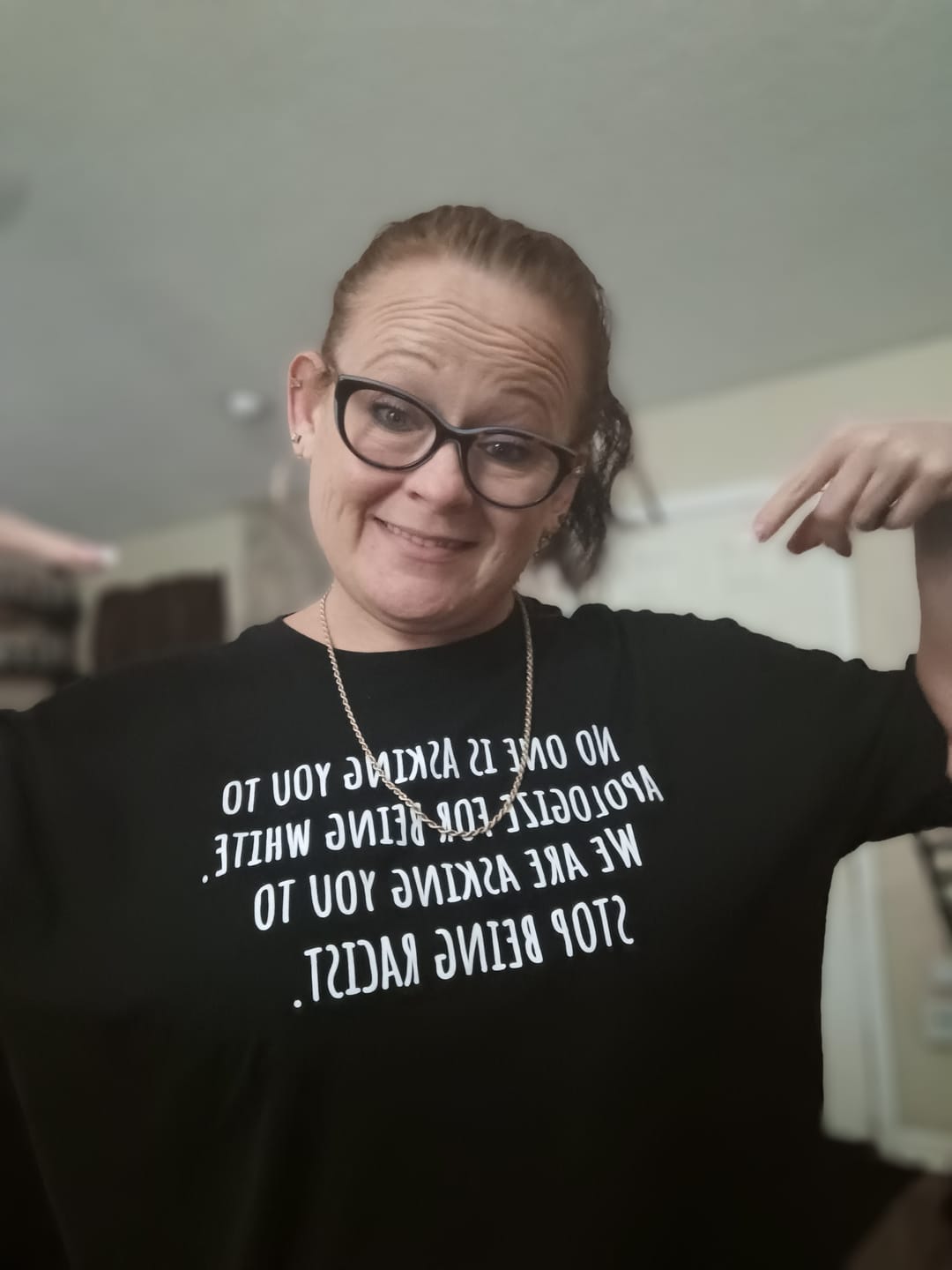 Customer photo review of No one is asking you to apologize for being white. We are asking you to stop being racist Unisex Tee