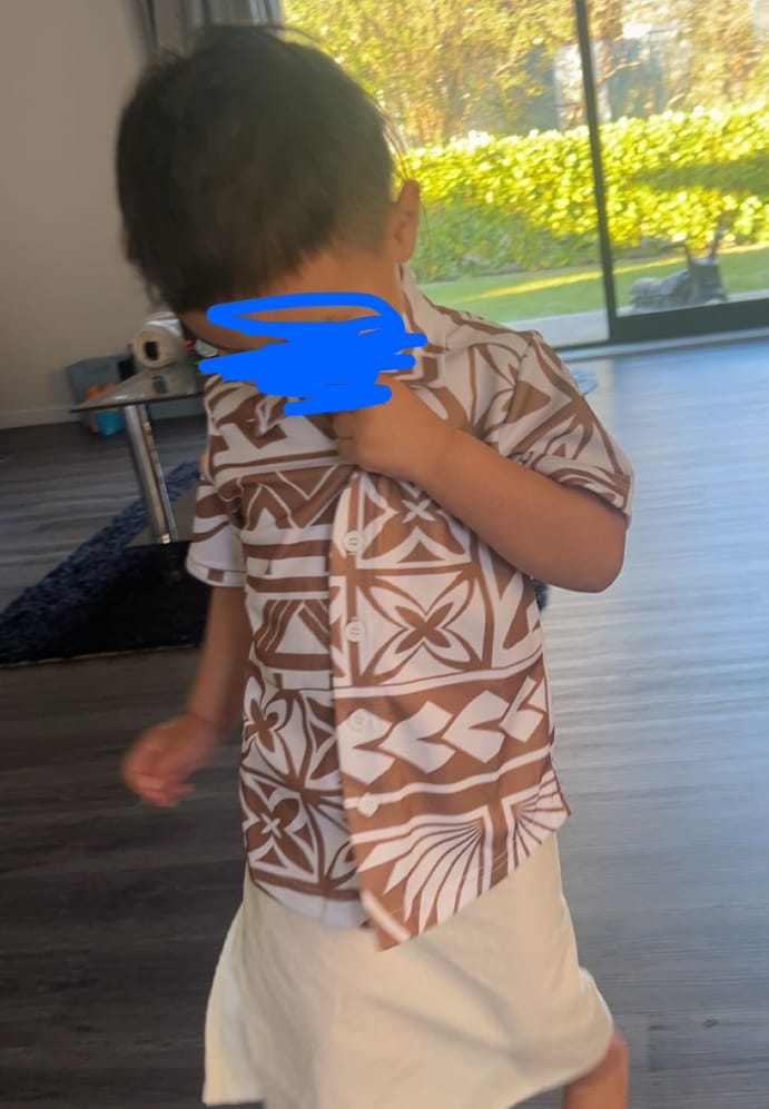 Customer photo review of TIMENA BROWN BOYS SHIRT