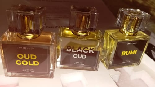 Customer's Royal Oud Collection featuring three glass perfume bottles named Oud Gold, Black Oud, and Rumi.