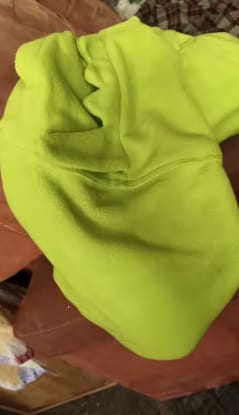 Customer photo review of DracoWrap™ | Manta-portabebés a prueba de viento con capucha de dinosaurio
