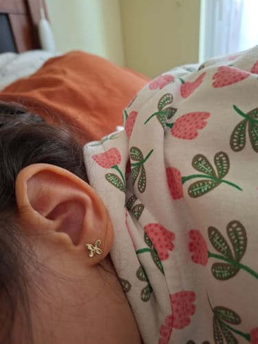 Customer photo review of AROS DE NIÑA MARIPOSA BAÑO DE ORO