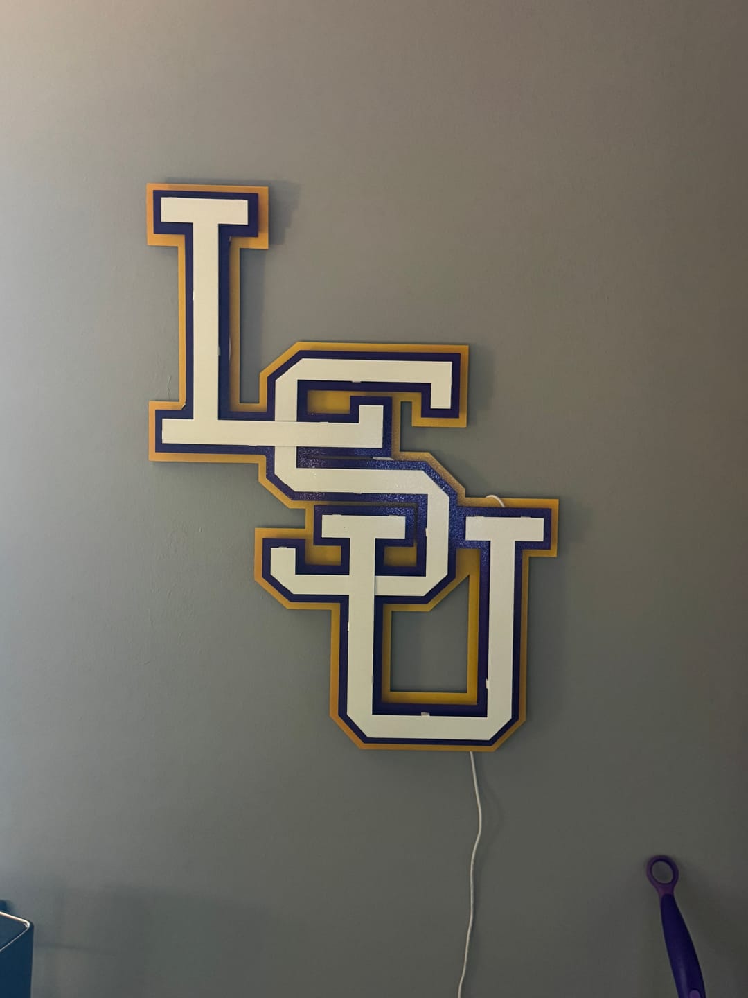 Customer photo review of LSU Tigers Interlocking Baseball 3D Metal Wall Art