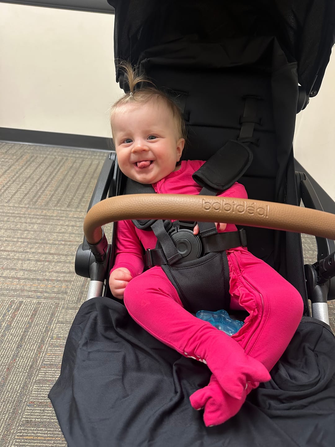 Customer photo review of Ruffled Bamboo Zippy Sleeper in Hottest Pink