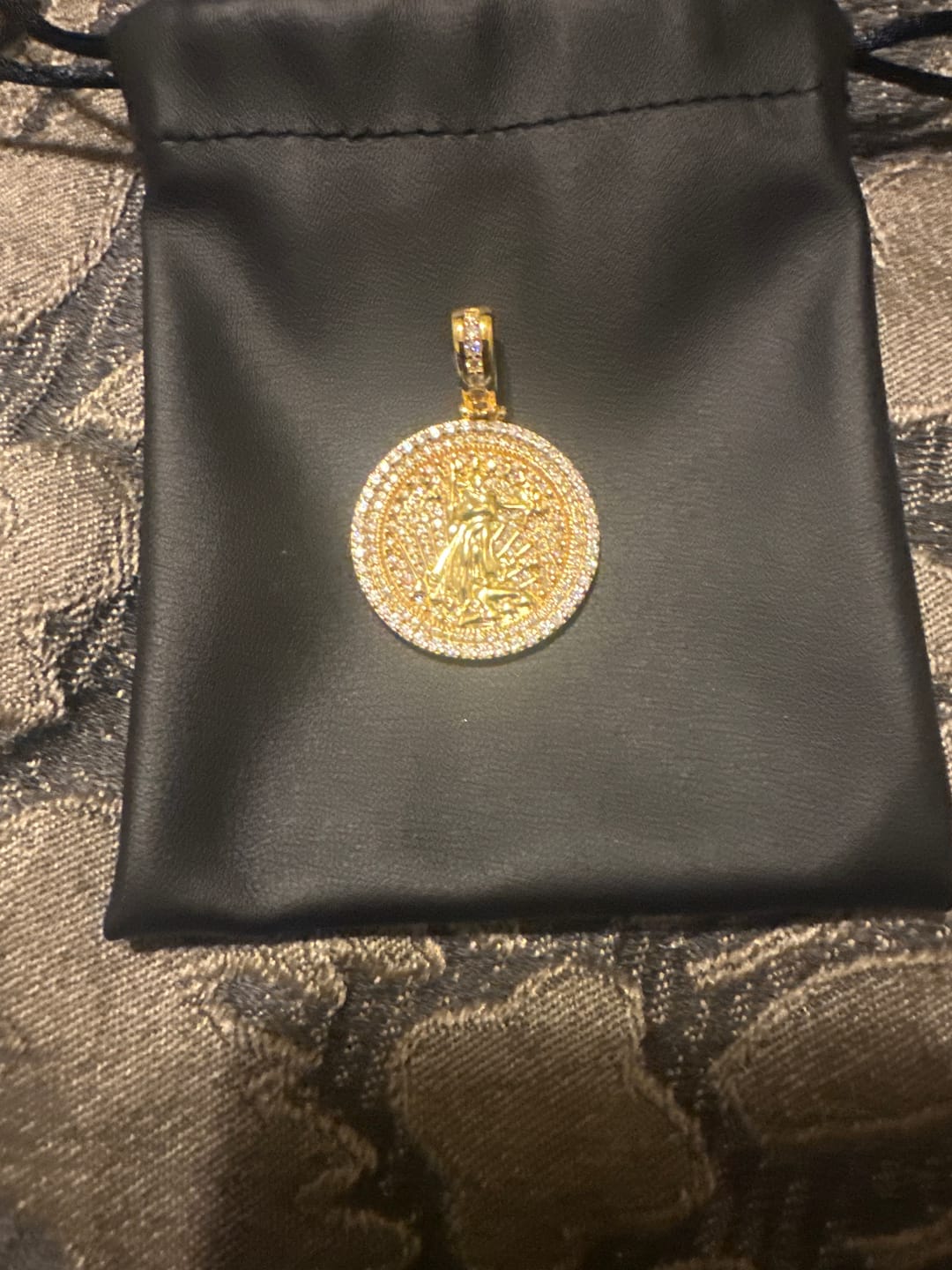 Customer photo review of Liberty Round 1.50 Carat VVS Moissanite Pendant .925 Sterling Silver