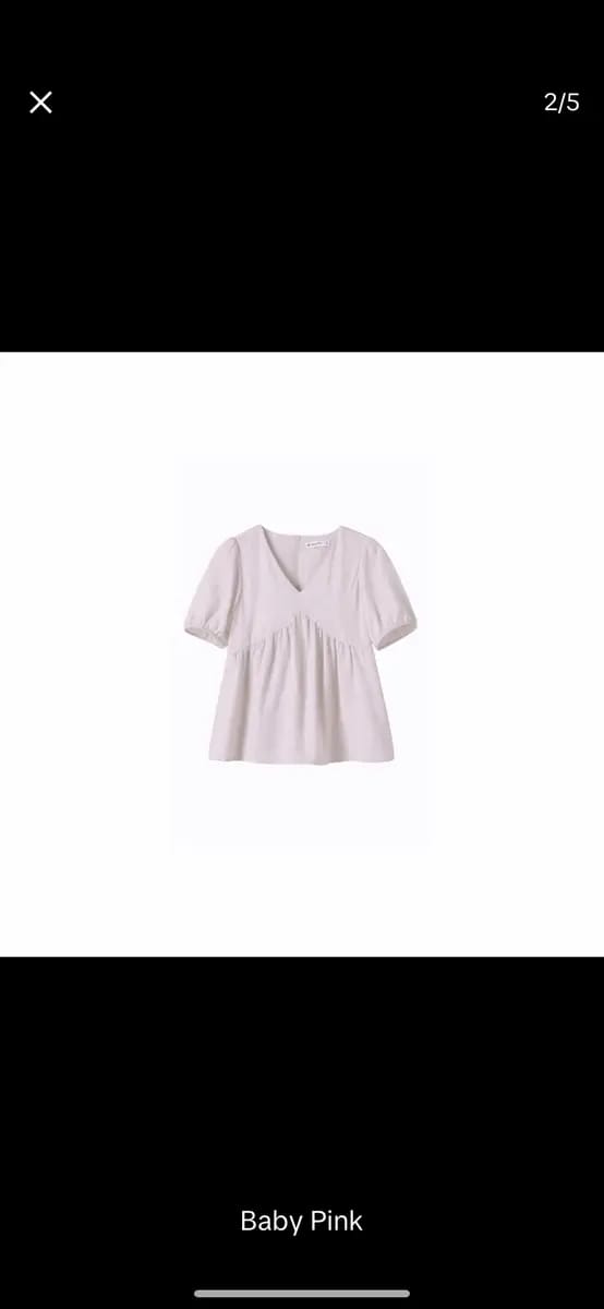 Customer photo review of V-Neck Short Sleeve Flowy Babydoll Blouse