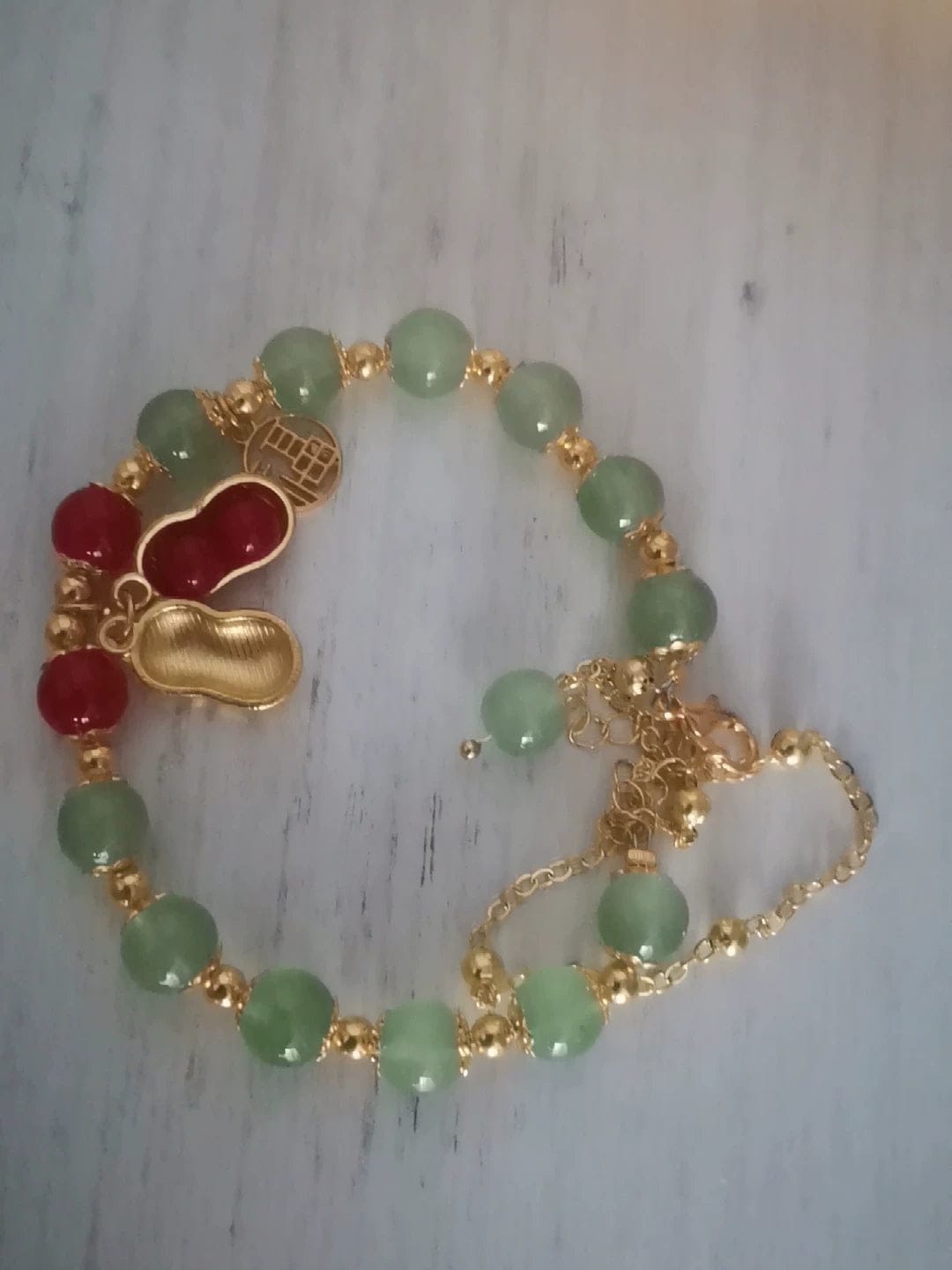 Customer photo review of FREE Today: Good Fortune & Prosperity Hetian Jade Peanut Charm Double Layer Luck Bracelet