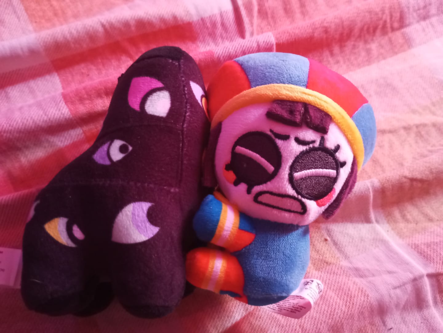 Customer photo review of Pomni & Abstraction Magnetic Plush Keychains