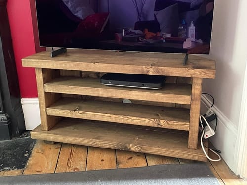 Customer photo review of Rustic Chunky-Plank Corner TV Stand, Solid Wood Media Console with Open Shelves in Warm Oak Tone