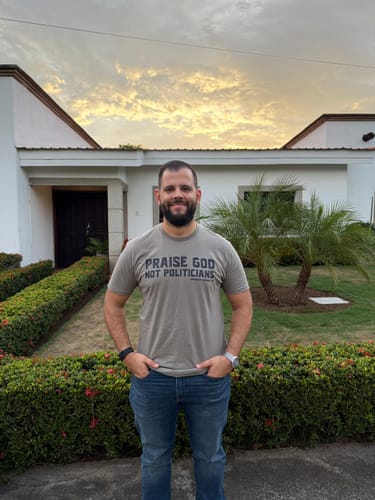 Customer photo review of IN GOD WE TRUST TEE