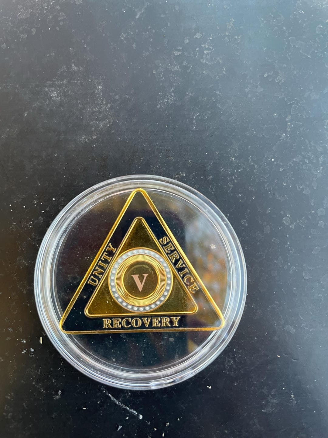 Customer photo review of Personalized Triangle Glimmer Amber Dream Sobriety Coin – Personalize Any Day, Month or Year