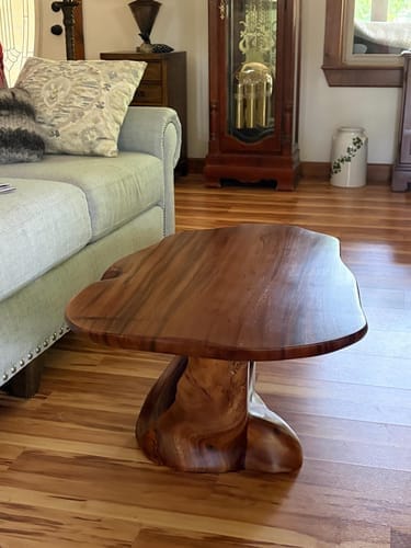 Customer photo review of Sculptural Freeform Coffee Table, Organic Carved Base Solid Wood Statement Table for Living Room