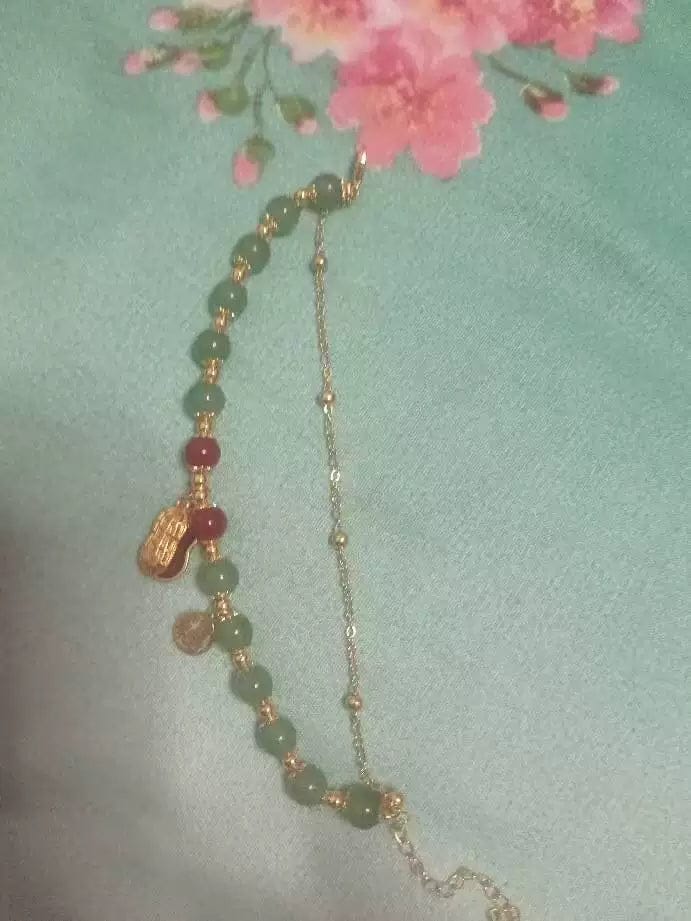 Customer photo review of FuAttract Good Fortune & Prosperity Hetian Jade Peanut Charm Double Layer Luck Bracelet