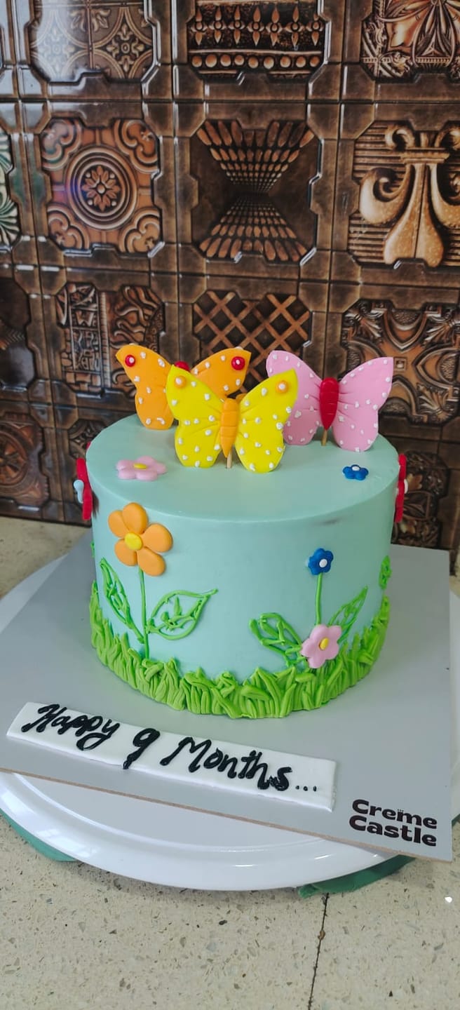 Customer photo review of Flowers and Butterflies Cake