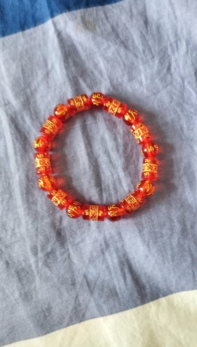 Customer photo review of FuAttract Protection Luck & Prosperity Colorful Om Mani Mantra Fortune Money Bracelet