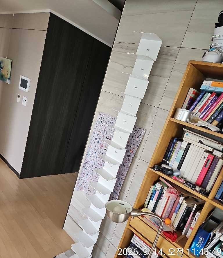 Customer photo review of ORIGINAL PTOLOMEO - h 215 - Open freestanding stainless steel bookcase