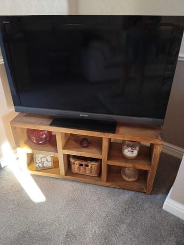 Customer photo review of Reclaimed-Look Open-Shelf Console Table — 6-Cubby Solid Wood Media Unit & Entryway Bookshelf, Brown