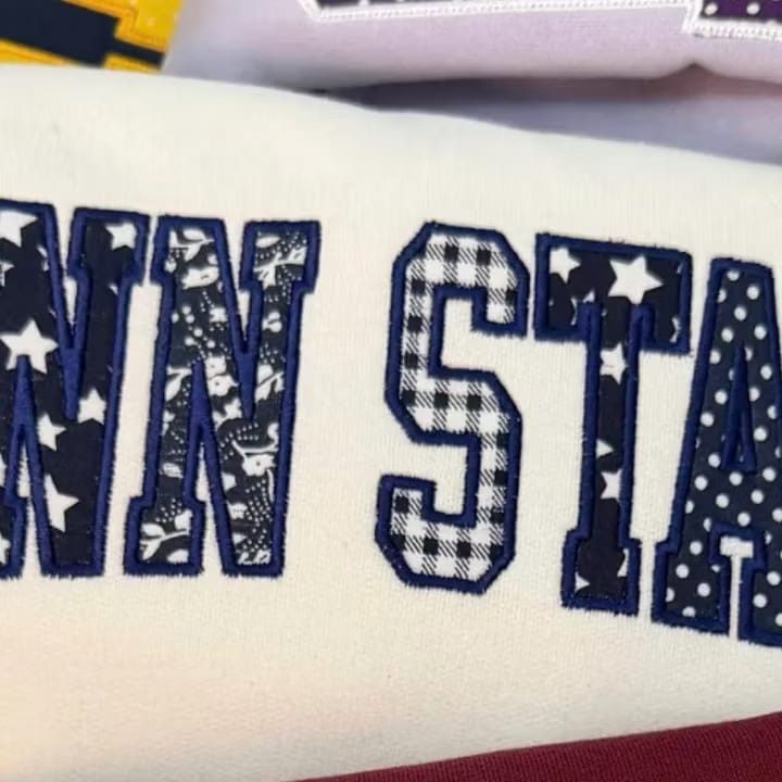 Customer photo review of Custom Patchwork Fabric Embroidered Sweatshirt Team and School Name Applique Varsity Letters
