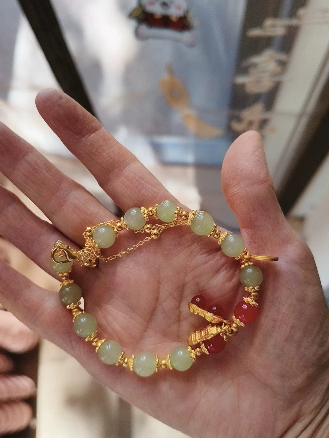 Customer photo review of FREE Today: Good Fortune & Prosperity Hetian Jade Peanut Charm Double Layer Luck Bracelet