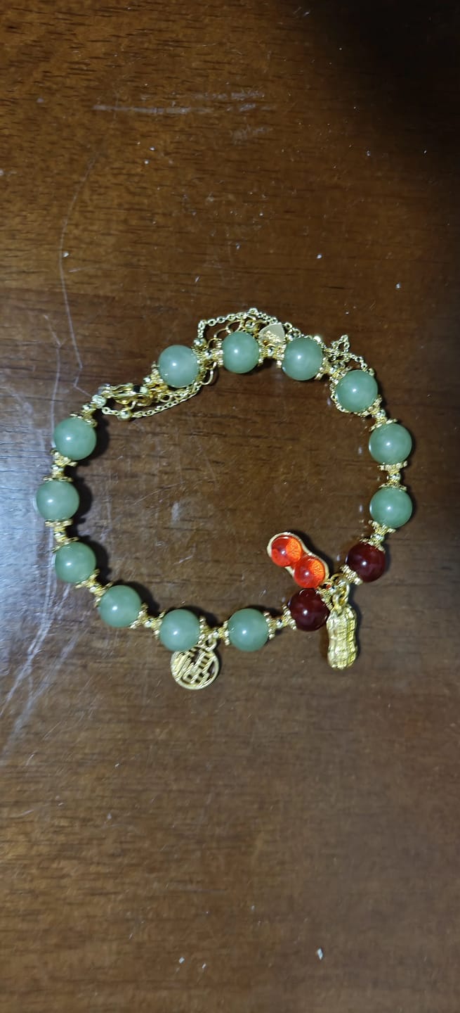 Customer photo review of FuAttract Good Fortune & Prosperity Hetian Jade Peanut Charm Double Layer Luck Bracelet