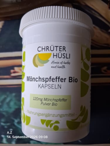 Customer's white container of Mönchspfeffer Kapseln, showing clear product labeling and brand logo.