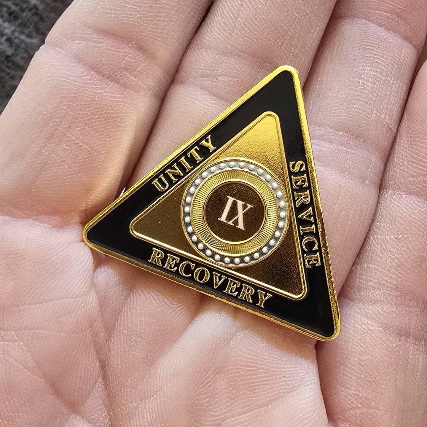 Customer photo review of Personalized Triangle Glimmer Amber Dream Sobriety Coin – Personalize Any Day, Month or Year