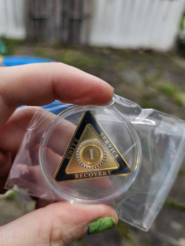 Customer photo review of Personalized Triangle Glimmer Amber Dream Sobriety Coin – Personalize Any Day, Month or Year