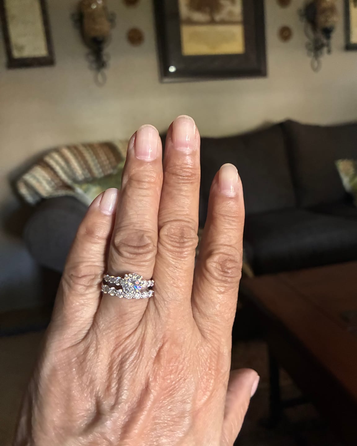 Customer photo review of Round Moissanite Sterling Silver Wedding Band Stackable Ring