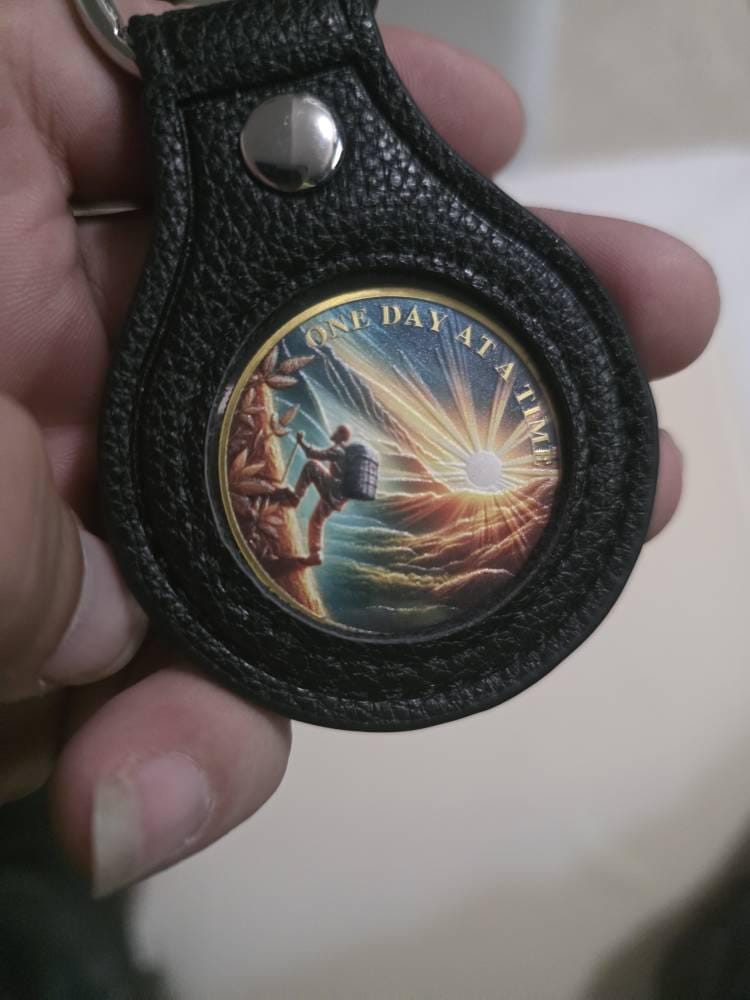 Customer photo review of One Day at a Time Hiking Sobriety Coin