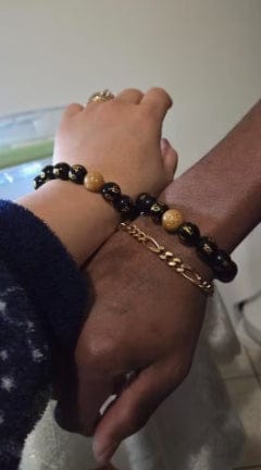 Customer photo review of FuAttract Protection Guardian & Buddhist Blessings Gold Foil Om Mani Mantra Black Onyx Energy Bracelet