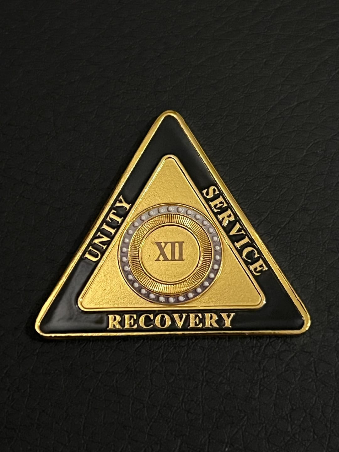 Customer photo review of Personalized Triangle Glimmer Amber Dream Sobriety Coin – Personalize Any Day, Month or Year