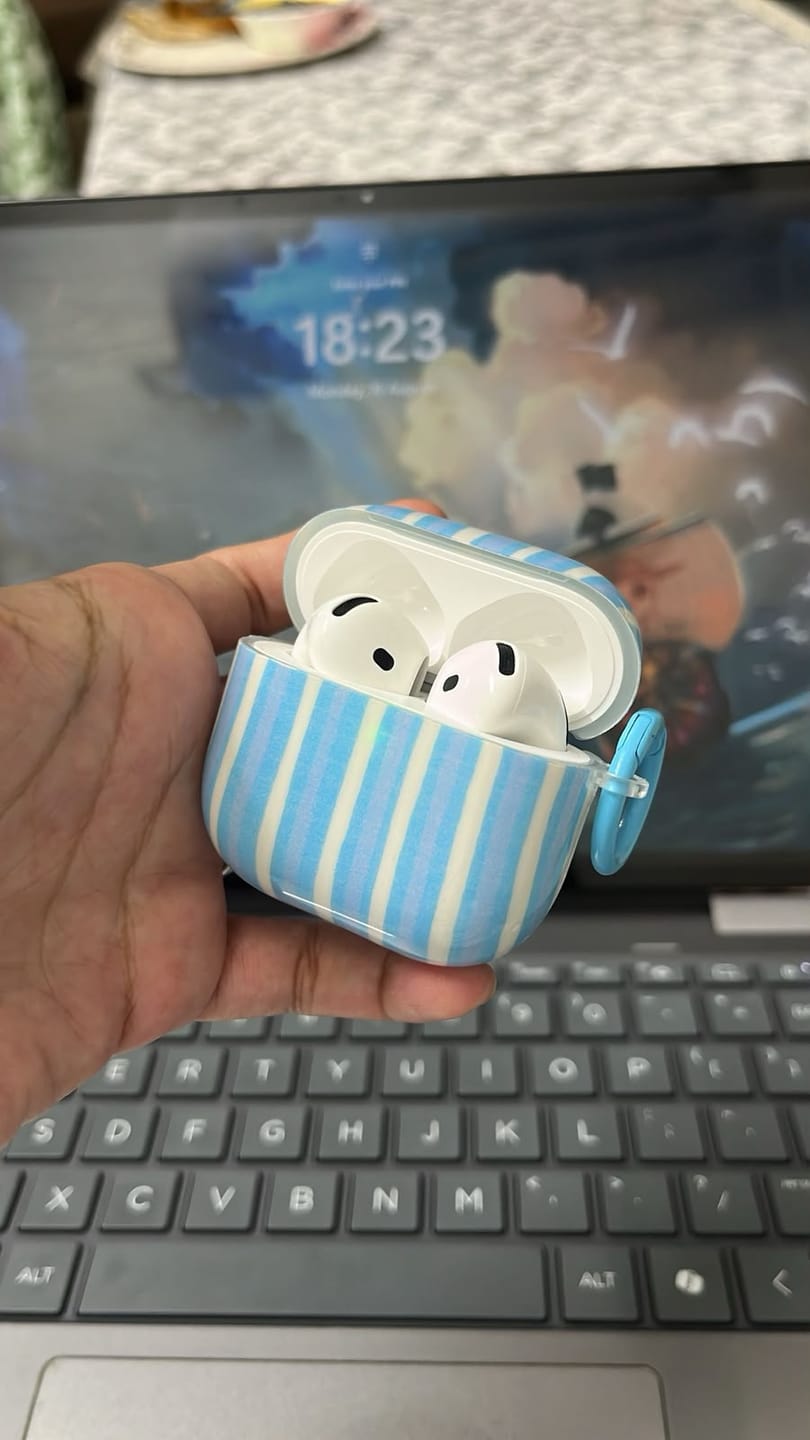 Customer photo review of Wavy Bumper Stripes Glossy Airpod Pre-Order Case With Lanyard