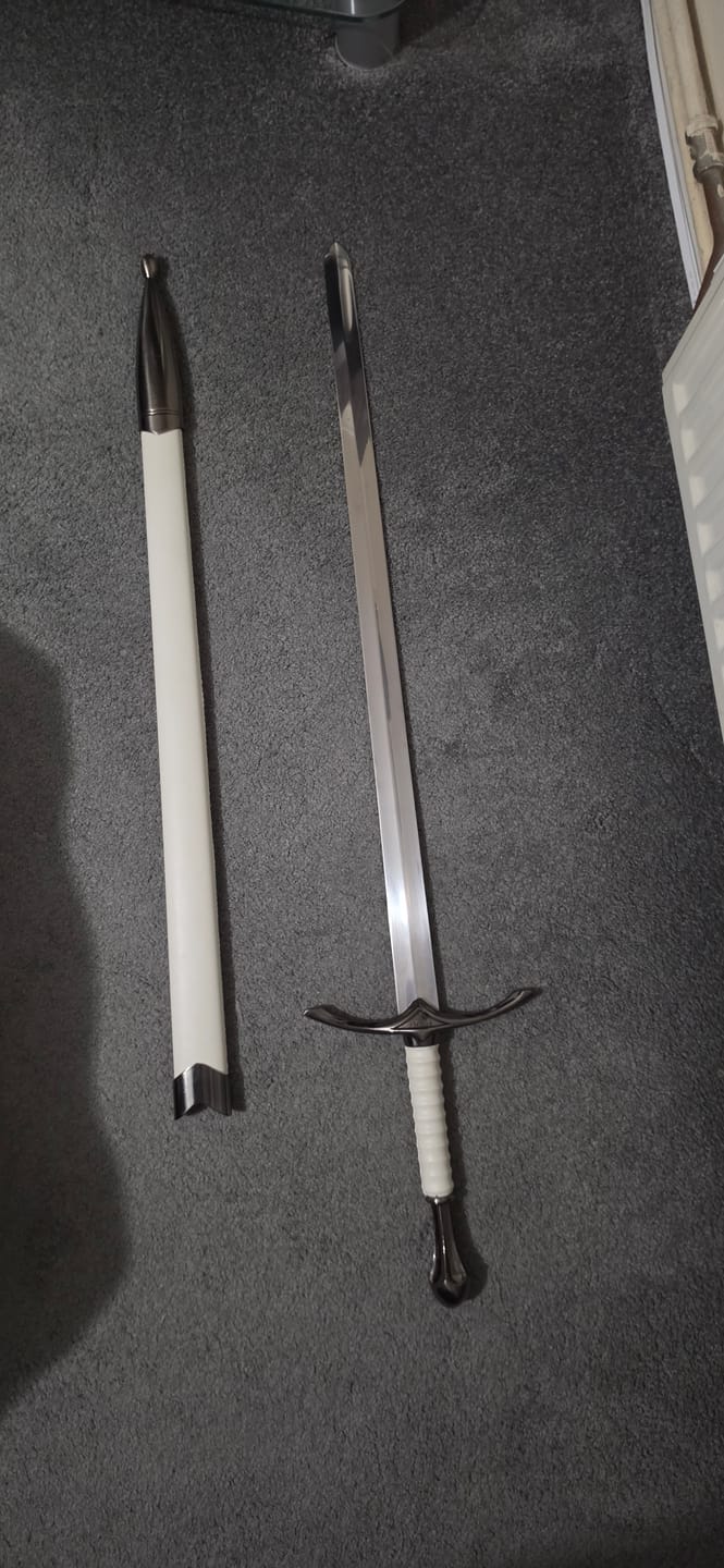 Customer photo review of Lord of the Rings Gandalf's Glamdring Wizard White Metal Sword
