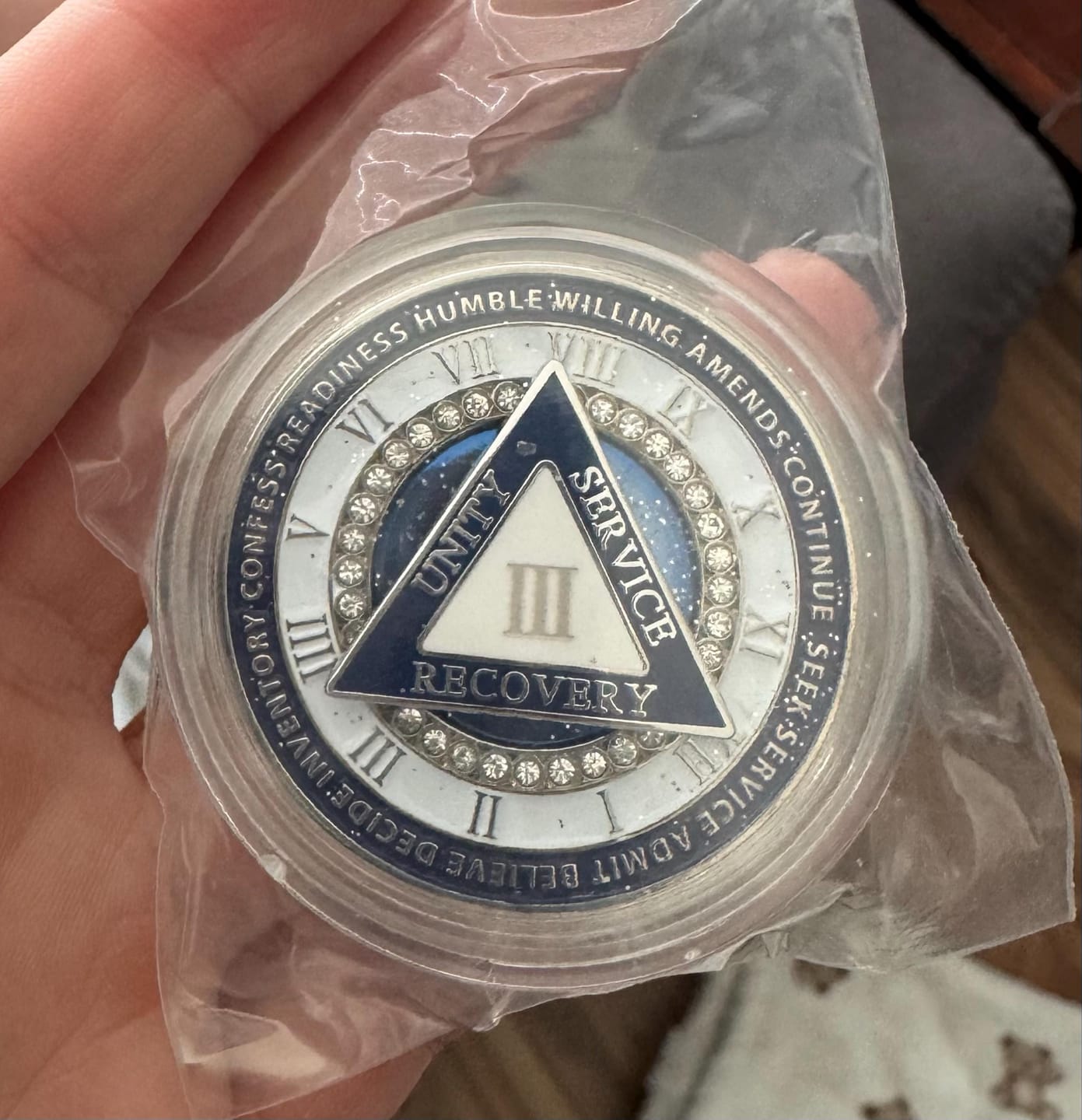Customer photo review of Personalized Rotating Triangle 12 Steps Sobriety Coin – Personalize Any Day, Month or Year