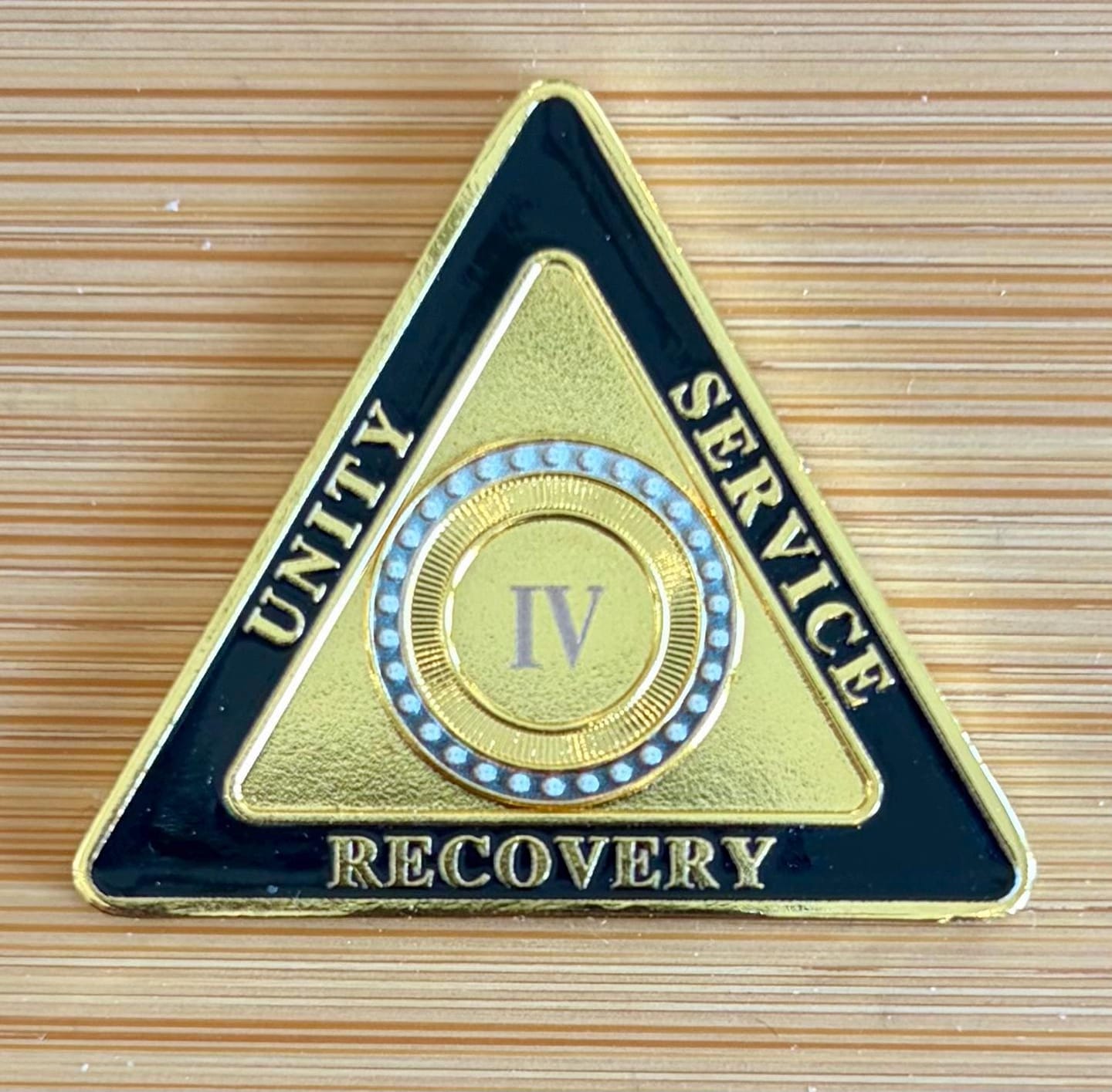 Customer photo review of Personalized Triangle Glimmer Amber Dream Sobriety Coin – Personalize Any Day, Month or Year