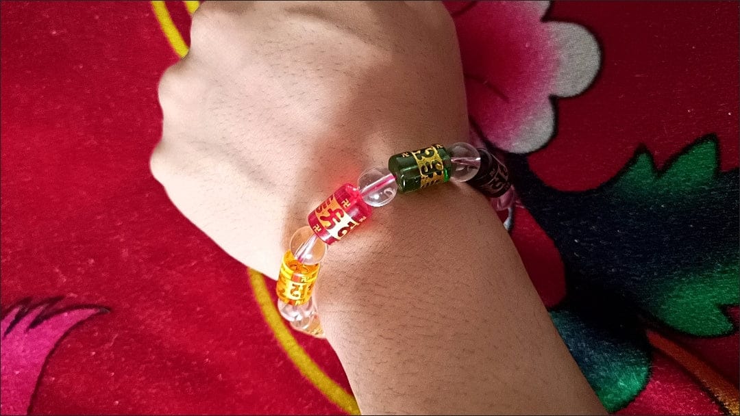 Customer photo review of FuAttract Protection Luck & Prosperity Colorful Om Mani Mantra Fortune Money Bracelet