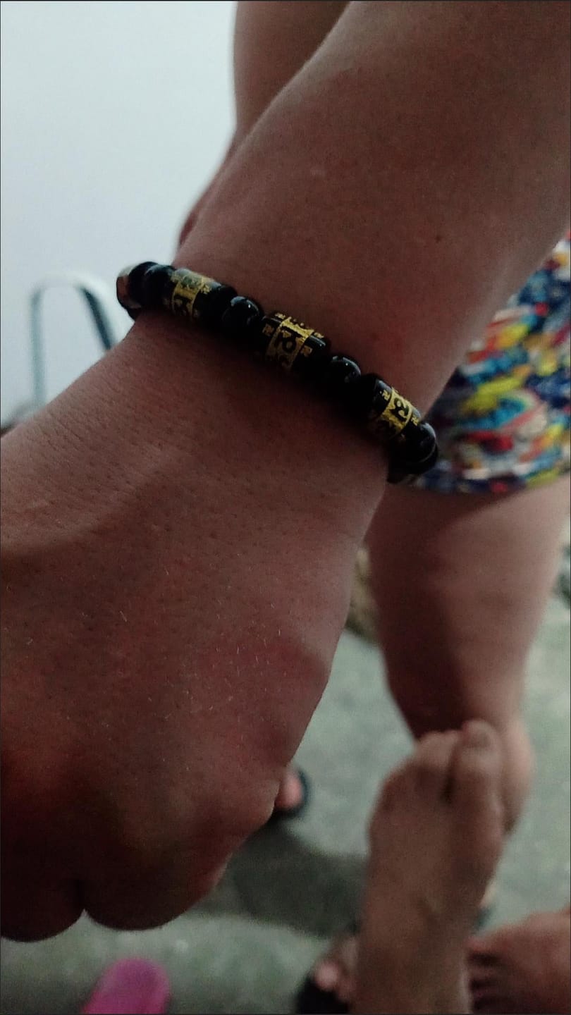 Customer photo review of FuAttract Protection Luck & Prosperity Colorful Om Mani Mantra Fortune Money Bracelet