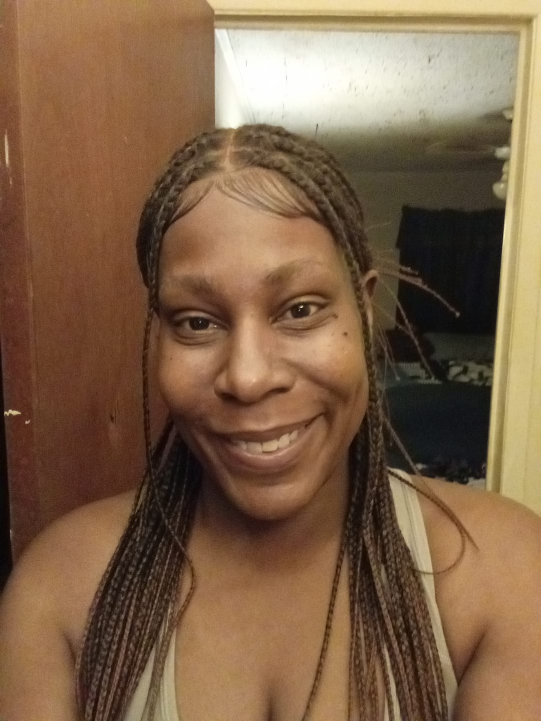 Customer photo review of Kora - Pre Bleached Human Hair Lace Lightweight Knotless Swiss HD Lace Box Braided Wig 100 Strands