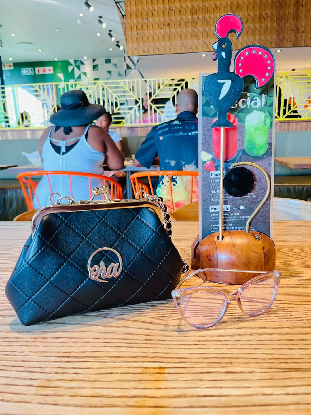 Customer photo review of ERA Mini Kisslock Chain Bag – Black