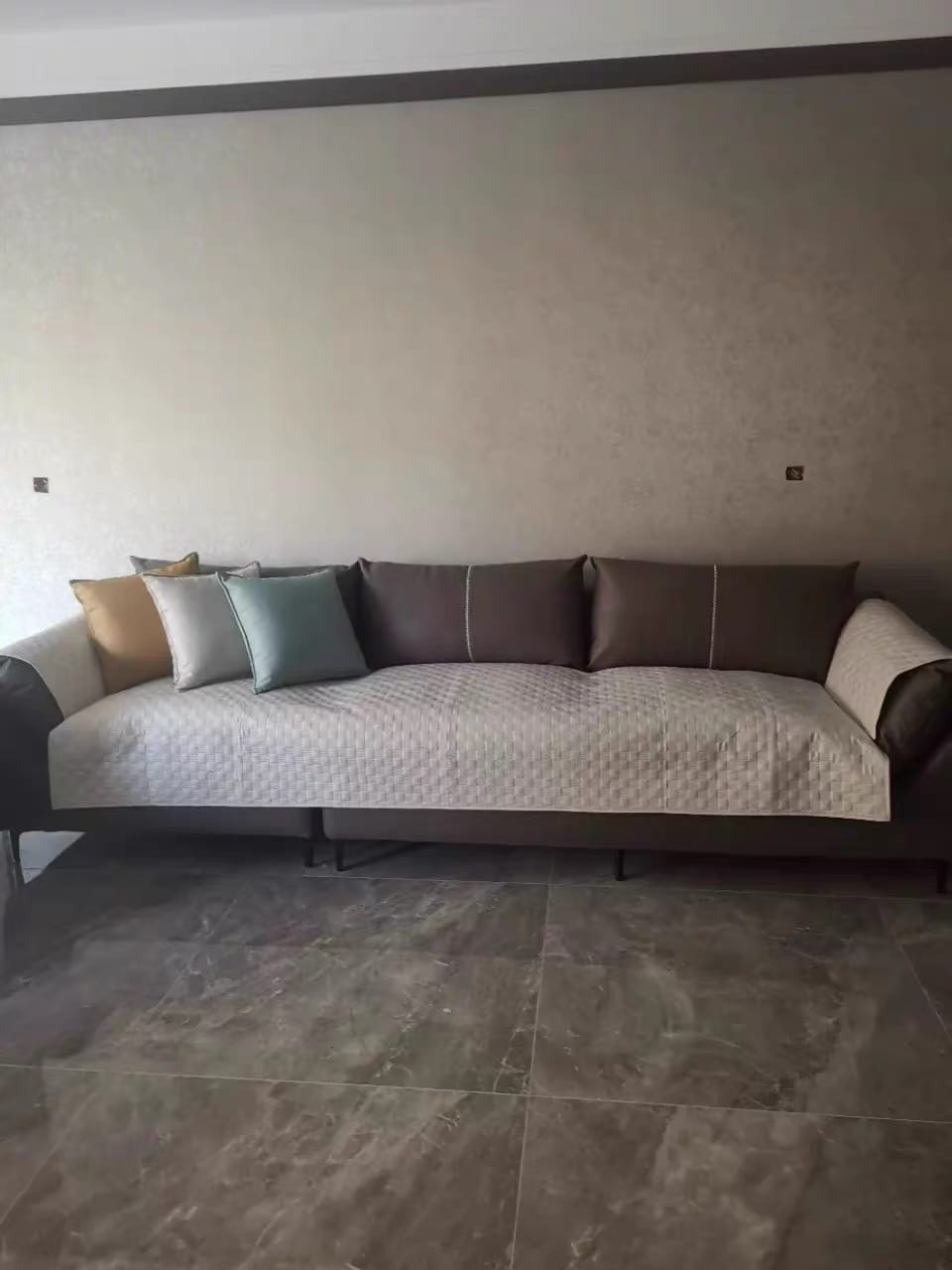 Customer photo review of LeatherAir Water-Resistant Quilted Modular Sofa Protector