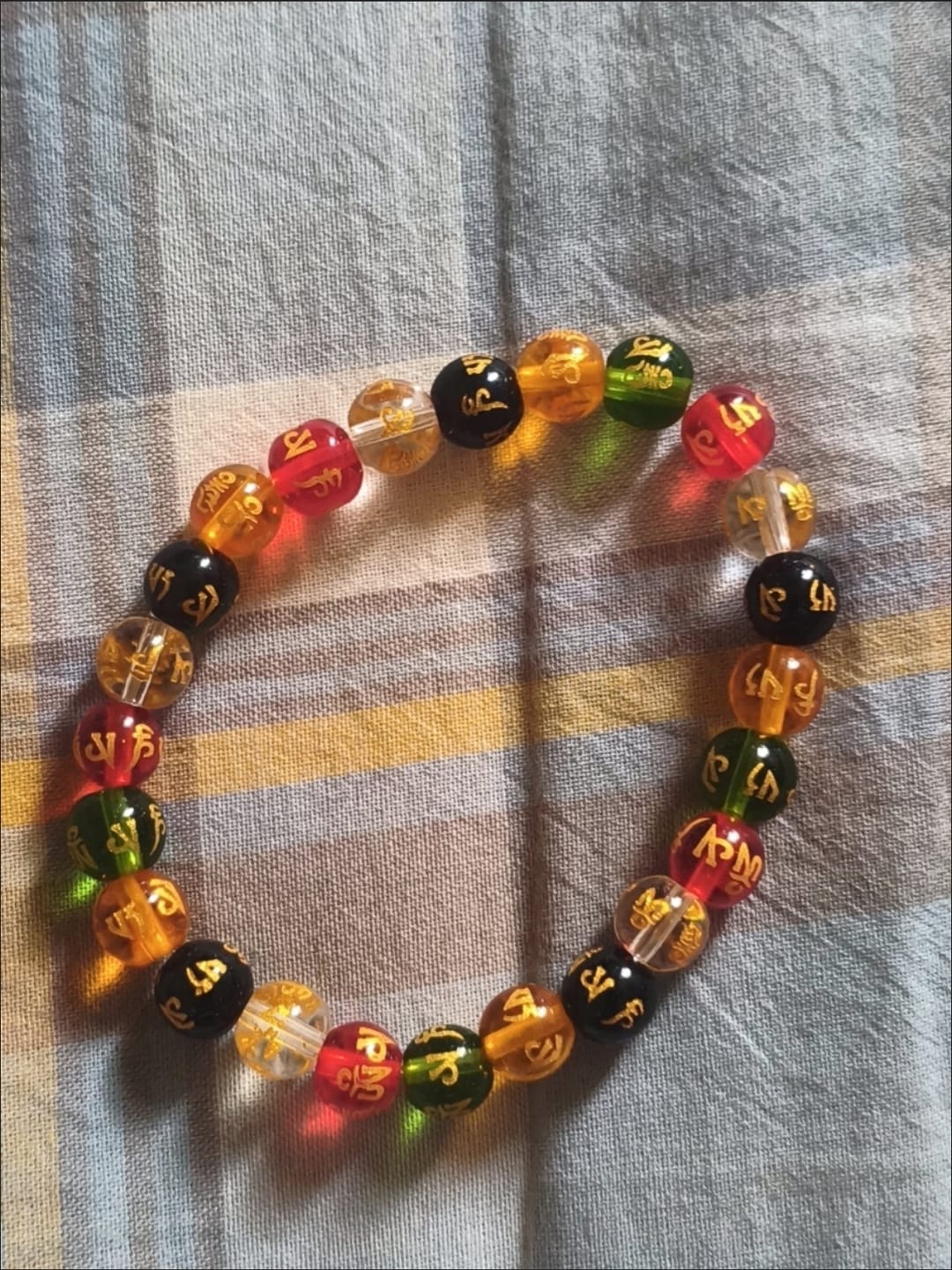 Customer photo review of FREE Today: Protection Harmony & Good Luck Om Mani Mantra Gold Foil Engraved Colorful Glaze Bracelet