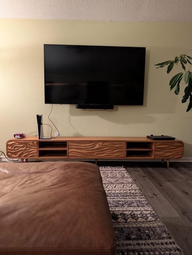 Customer photo review of 3D-Carved Wave-Door Media Console – Scandinavian Solid Wood TV Stand in Warm Brown with Open Shelf Bay