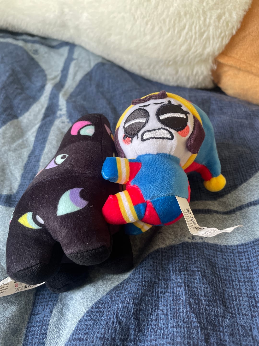 Customer photo review of Pomni & Abstraction Magnetic Plush Keychains