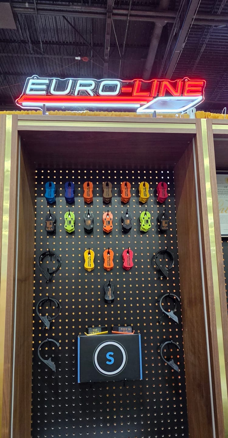 Customer photo review of 3 Tabletop Signs + 10 Keychains