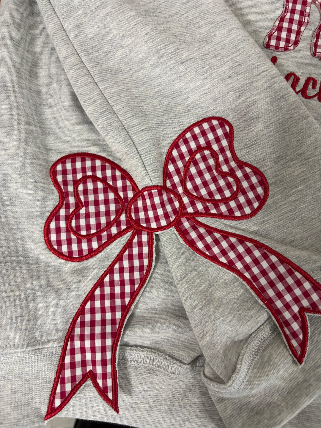Customer photo review of Custom Tennessee Volunteers Women’s Team Spirit Sweatshirt – Applique Embroidered Side Bow Pullover