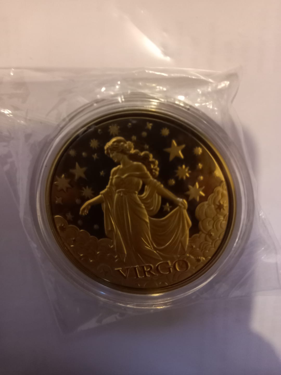 Customer photo review of 24K Yellow Gold (99.99% Gold Purity) Zodiac Sign Coin