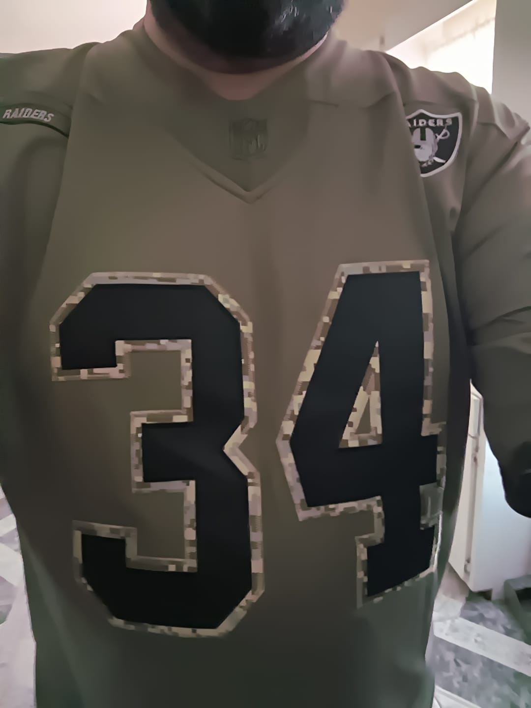 Customer photo review of 2022 Salute To Service Retired Player Limited – Olive