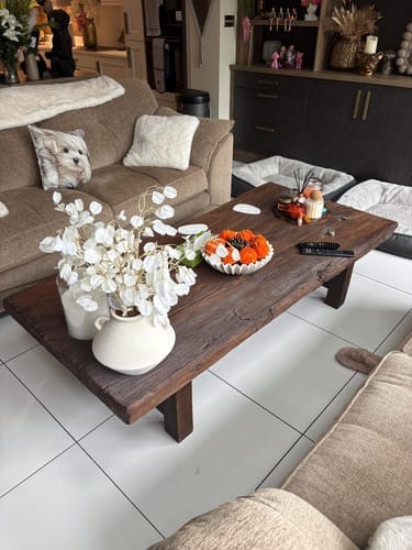 Customer photo review of Chunky Reclaimed Beam Coffee Table, Rustic Cabin Solid Wood Slab Table with Cracked Oak Grain